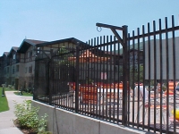 iron-anvil-fences-spear-top-single-rail-extended-zermatt-pool-fence-in-midway-3-1