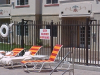 iron-anvil-fences-spear-top-single-rail-extended-zermatt-pool-fence-in-midway-3-3