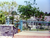iron-anvil-gates-by-others-driveway-flat-and-scrolls-across-top