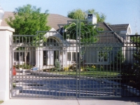 iron-anvil-gates-by-others-driveway-french-curve-tall-oaks-copy