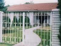 iron-anvil-gates-by-others-man-flat-scrolls