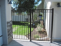 61-0061-Iron-Anvil-Gates-Man-Arch-52-0031-MEEKS-8TH-AVE-99-