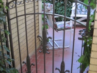 iron-anvil-gates-man-arch-casting-pattern-and-spears