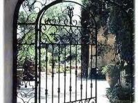 iron-anvil-gates-man-arch-muller-marcella