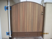 iron-anvil-gates-man-arch-rual-coray-rear-view-15193-steel-and-wood-1