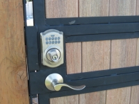 iron-anvil-gates-man-flat-steel-wood-door-2300-e-latch-pushbutton