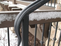 iron-anvil-handrails-post-mount-termination-moulded-cap-snake-tongue-ross-handrail-glenwild
