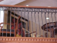 iron-anvil-railing-belly-rail-double-top-square-scroll-top-casting-zermatt-lobby-midway-5-3