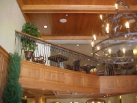 iron-anvil-railing-belly-rail-double-top-square-scroll-top-casting-zermatt-lobby-midway-5-4