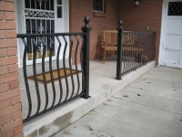 iron-anvil-railing-belly-rail-single-top-flat-bar-above-1300-east-2