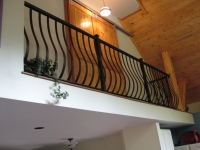 iron-anvil-railing-belly-rail-single-top-flat-bar-dan-byrne-immigration-2