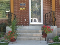 iron-anvil-railing-belly-rail-single-top-round-collars-on-elgin-30th-e-30th-s-1