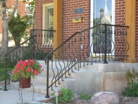 iron-anvil-railing-belly-rail-single-top-round-collars-on-elgin-30th-e-30th-s-2