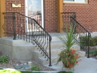 iron-anvil-railing-belly-rail-single-top-round-collars-on-elgin-30th-e-30th-s