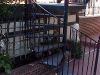 iron-anvil-railing-by-others-rail-spiral-stair-virgina-street-2-1-2