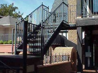 iron-anvil-railing-by-others-rail-spiral-stair-virgina-street-2-1-3