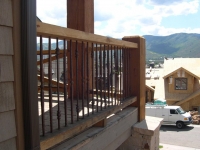 iron-anvil-railing-by-others-solid-bar-pickets-park-city