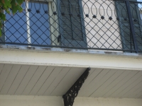 iron-anvil-railing-by-others-x-pattern-rail-with-doily-1-2