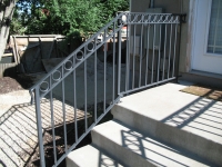 iron-anvil-railing-double-top-circles-back-deck-1