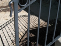 iron-anvil-railing-double-top-circles-back-deck-2