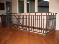 iron-anvil-railing-double-top-collars-10-1065-gold-medallion-all-pickets-with-collars-straight-stair-2