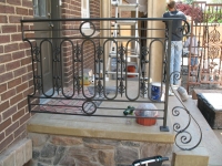 iron-anvil-railing-scrolls-and-patterns-repeating-circles-la-brett-job-14197-peter-mousdkondis-5