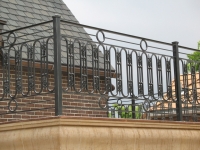 iron-anvil-railing-scrolls-and-patterns-repeating-circles-la-brett-job-14197-peter-mousdkondis-7