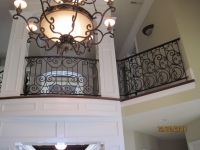 iron-anvil-railing-scrolls-and-patterns-repeating-stonebrook-tate-post-f