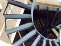 41-0010-iron-anvil-stairs-grand-circular-treads-angle-iron-park-city-1