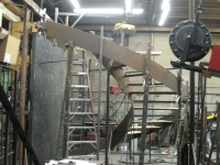 41-0060-iron-anvil-stairs-grand-circular-treads-concrete-13415-ferran-kilgore-2