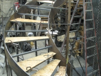 41-0060-iron-anvil-stairs-grand-circular-treads-concrete-13415-ferran-kilgore-4