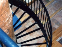 iron-anvil-stairs-spiral-angle-iron-no-tread-around-a-tree-42-1050-mike-holmes-17