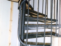 iron-anvil-stairs-spiral-angle-iron-plywood-picket-bend-at-top-41-1028-1