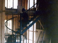 iron-anvil-stairs-spiral-angle-iron-plywood-picket-bend-at-top-41-1028-2