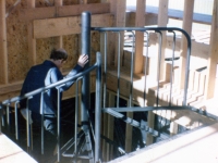 iron-anvil-stairs-spiral-angle-iron-plywood-picket-bend-at-top-41-1028-3