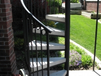 iron-anvil-stairs-spiral-concrete-circles-rail-farmington