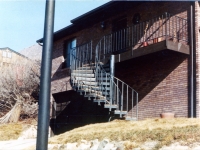 iron-anvil-stairs-spiral-concrete-extended-arm-centerville-41-1006