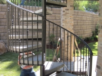 iron-anvil-stairs-spiral-concrete-reverse-over-smooth-cut-out-concrete-krantz-10