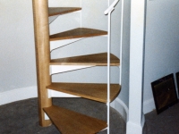iron-anvil-stairs-spiral-wood-step-wood-center-pole-01-092-3