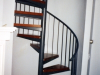iron-anvil-stairs-spiral-wood-steps-41-1004