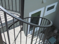 iron-anvil-stairs-spiral-wood-trex-wood-fix-it-wright-1a