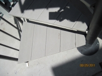 iron-anvil-stairs-spiral-wood-trex-wood-fix-it-wright-4