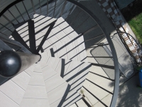 iron-anvil-stairs-spiral-wood-trex-wood-fix-it-wright-7