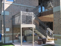 iron-anvil-stairs-double-stringer-treads-concrete-diamond-pattern-gustaferson-3