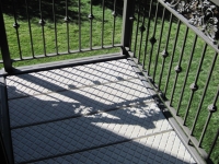 iron-anvil-stairs-double-stringer-treads-concrete-diamond-pattern-gustaferson-8