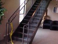 iron-anvil-stairs-double-stringer-treads-concrete-fill-njm-office-2