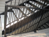 iron-anvil-stairs-double-stringer-treads-concrete-smooth-by-others1