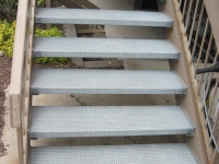 iron-anvil-stairs-double-stringer-treads-grip-strut-by-others