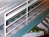 iron-anvil-stairs-double-stringer-treads-smooth-treads-carpet