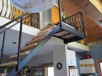 iron-anvil-stairs-double-stringer-treads-wood-byrne-immigration-1